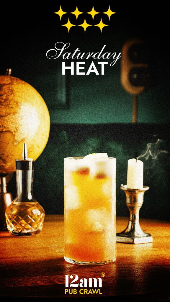 Saturday Heat Madrid Pub Crawl flyer showing a tall, icy golden drink, a globe, and a lit candle on a wooden table, with four gold stars and '12am Pub Crawl' logo. Experience the hottest nightlife in Madrid.